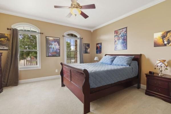bedroom featuring light carpet, baseboards, ornamental molding, and multiple windows