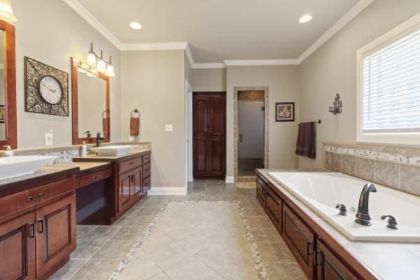 full bathroom featuring a bath, recessed lighting, tile patterned flooring, vanity, and ornamental molding