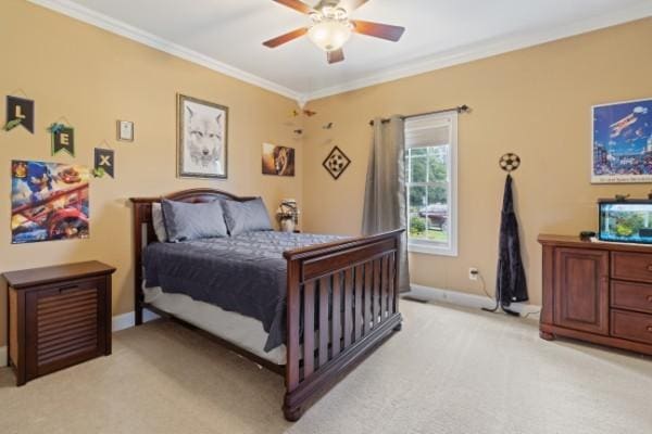 bedroom with ceiling fan, crown molding, baseboards, and light carpet
