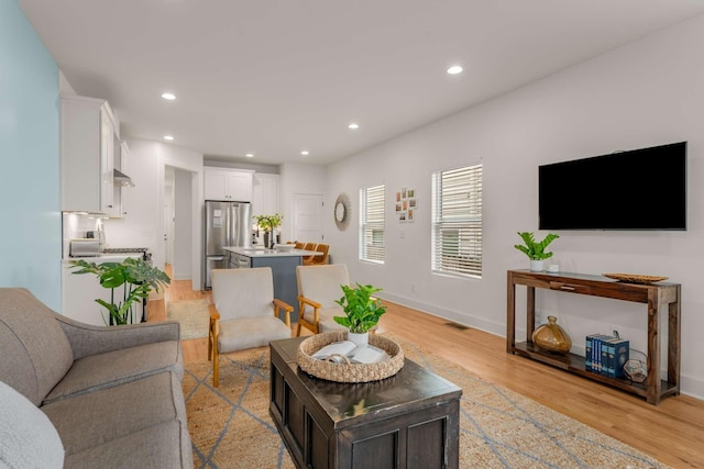 4009B Indiana Ave, Nashville, TN 37209 - living area featuring visible vents, recessed lighting, light wood-style floors, and baseboards