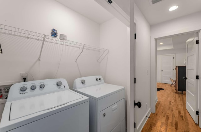 4009B Indiana Ave, Nashville, TN 37209 - laundry area with recessed lighting, visible vents, light wood finished floors, and washer and clothes dryer