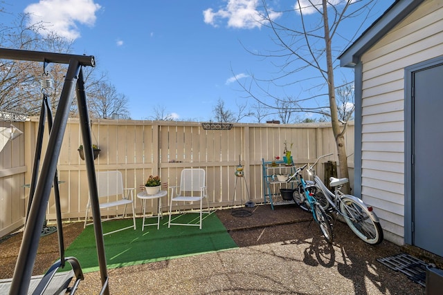 view of jungle gym featuring a fenced backyard
