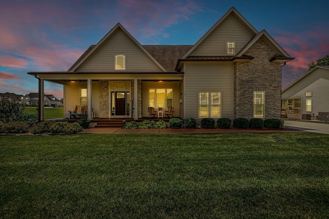 214 River Watch Way, Winchester, TN 37398 - view of front of property featuring stone siding, a front lawn, and covered porch