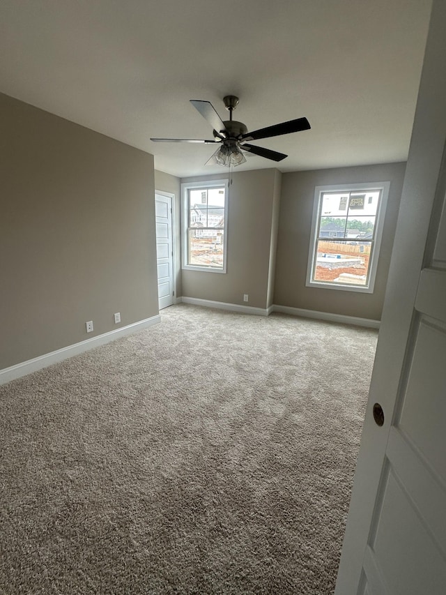 150 Cardinal Crk, Clarksville, TN 37040 - spare room featuring healthy amount of natural light, baseboards, a ceiling fan, and carpet flooring