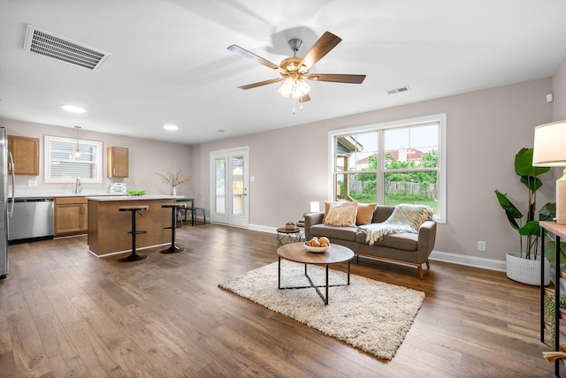 150 Cardinal Crk, Clarksville, TN 37040 - living room with wood finished floors, baseboards, and recessed lighting
