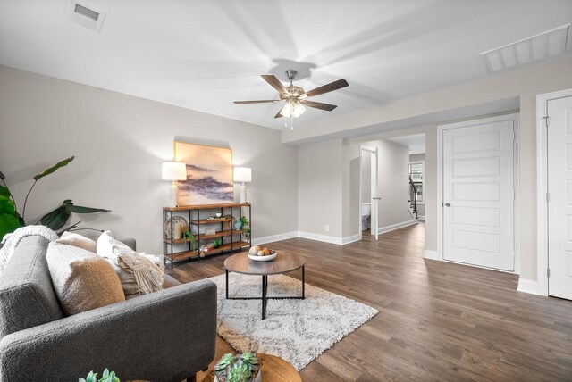 150 Cardinal Crk, Clarksville, TN 37040 - living room with ceiling fan, wood finished floors, and baseboards