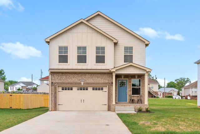 150 Cardinal Crk, Clarksville, TN 37040 - view of front of property featuring brick siding, concrete driveway, an attached garage, and board and batten siding