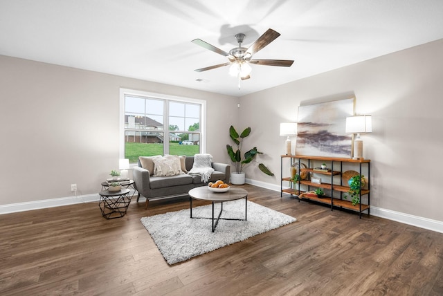 150 Cardinal Crk, Clarksville, TN 37040 - living room with baseboards, wood finished floors, and a ceiling fan