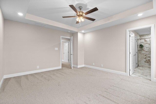 150 Cardinal Crk, Clarksville, TN 37040 - unfurnished bedroom with carpet floors, baseboards, recessed lighting, a raised ceiling, and connected bathroom