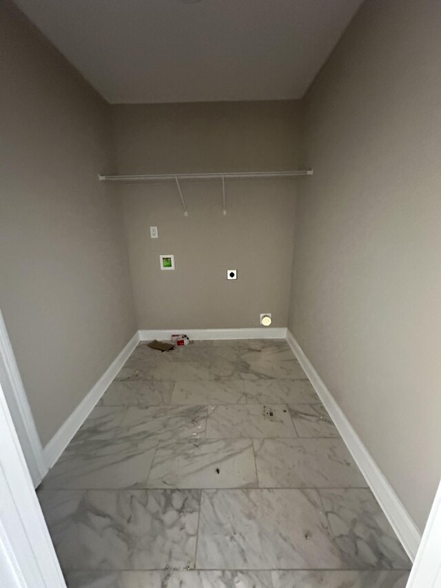 150 Cardinal Crk, Clarksville, TN 37040 - laundry room featuring washer hookup, baseboards, marble look tiles, and electric dryer hookup