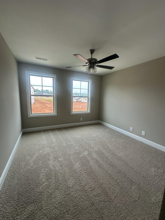 150 Cardinal Crk, Clarksville, TN 37040 - spare room featuring baseboards, carpet floors, and ceiling fan