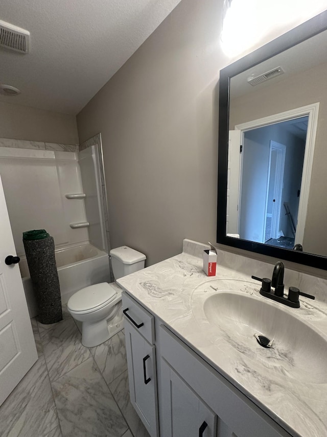 155 Cardinal Crk, Clarksville, TN 37040 - bathroom featuring marble look tile flooring, vanity, toilet, and shower / washtub combination