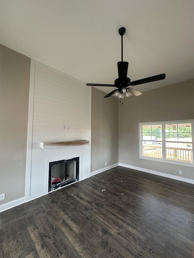 155 Cardinal Crk, Clarksville, TN 37040 - unfurnished living room with a ceiling fan, wood finished floors, a fireplace, and baseboards