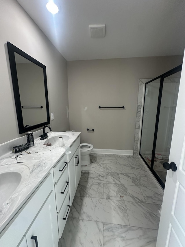 155 Cardinal Crk, Clarksville, TN 37040 - full bathroom with marble look tile flooring, a shower stall, toilet, double vanity, and baseboards