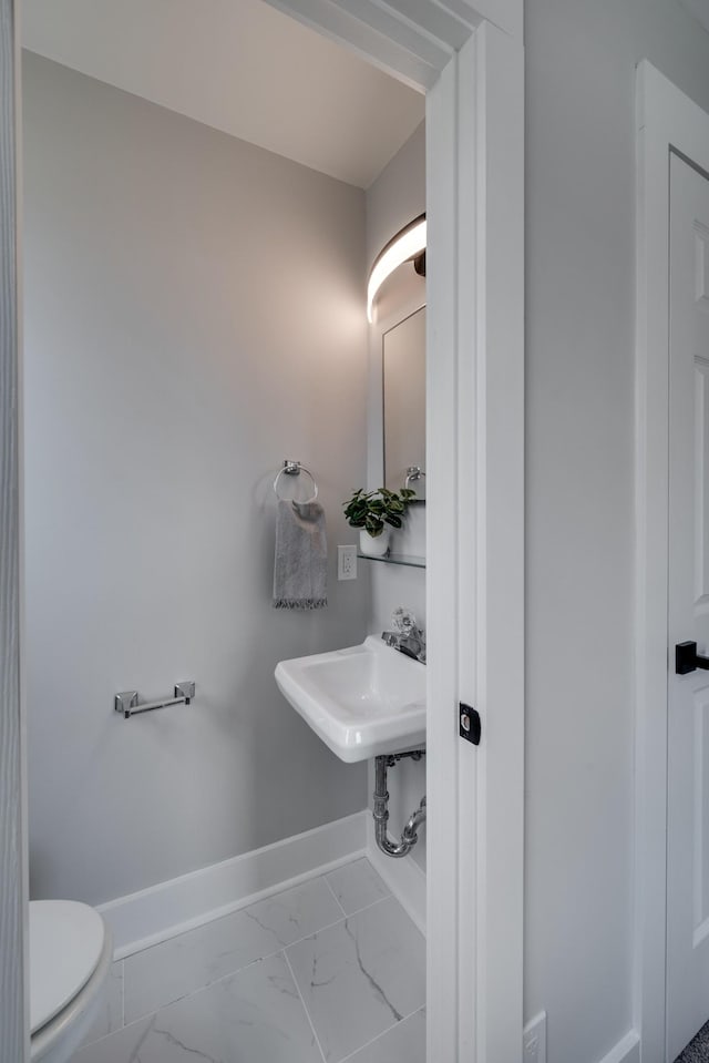 427A Kinhawk Ct, Nashville, TN 37211 - bathroom with toilet, baseboards, marble finish floor, and a sink