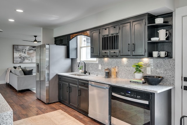 427A Kinhawk Ct, Nashville, TN 37211 - kitchen featuring tasteful backsplash, oven, stainless steel refrigerator with ice dispenser, and dark wood-style flooring