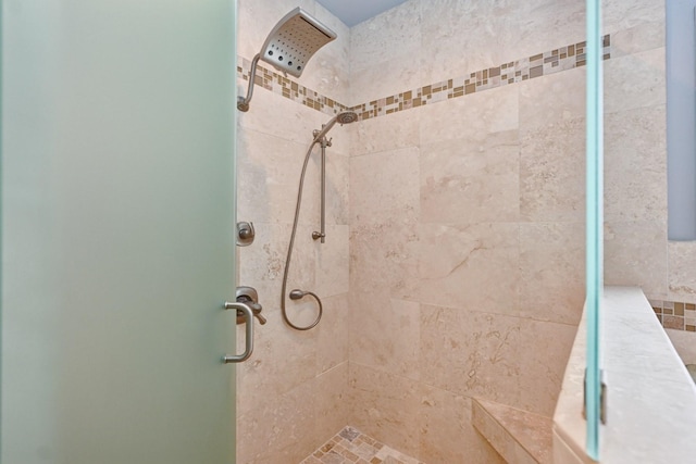bathroom featuring a shower stall