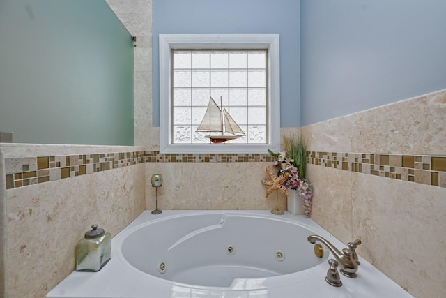 full bath featuring a whirlpool tub