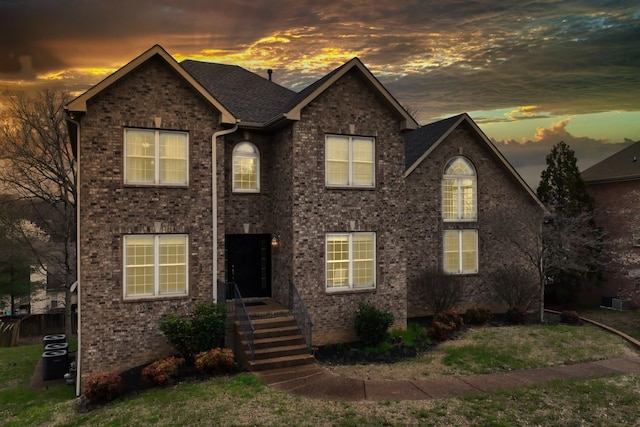 view of front of property with brick siding