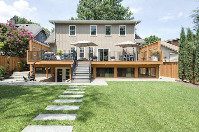 1926 20th Ave S, Nashville, TN 37212 - rear view of house featuring a deck, fence, stairway, and a yard