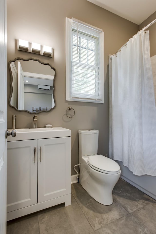 1926 20th Ave S, Nashville, TN 37212 - full bathroom featuring shower / bath combination with curtain, toilet, and vanity