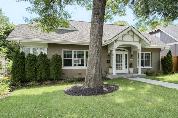 1926 20th Ave S, Nashville, TN 37212 - english style home featuring a shingled roof and a front yard