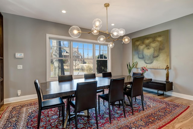 1926 20th Ave S, Nashville, TN 37212 - dining space with baseboards, wood finished floors, a chandelier, and recessed lighting