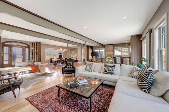 1926 20th Ave S, Nashville, TN 37212 - living room featuring recessed lighting, a healthy amount of sunlight, a chandelier, and wood finished floors