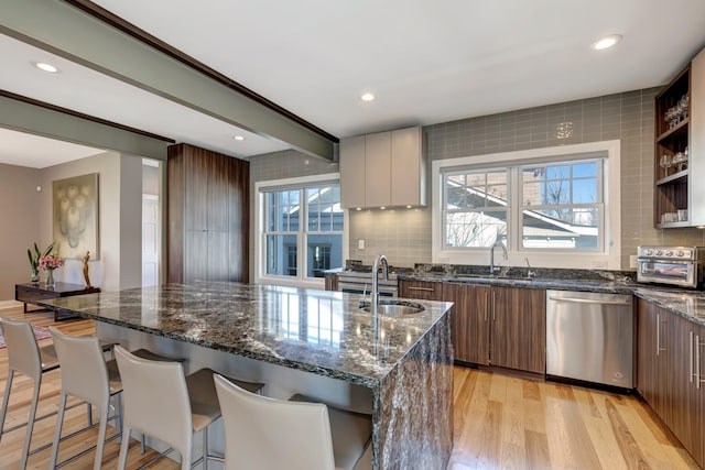 1926 20th Ave S, Nashville, TN 37212 - kitchen with modern cabinets, light wood finished floors, a sink, and dishwasher