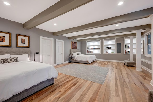 1926 20th Ave S, Nashville, TN 37212 - bedroom with baseboards, light wood-style flooring, and beamed ceiling