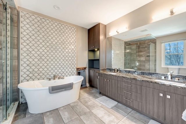 1926 20th Ave S, Nashville, TN 37212 - full bath featuring visible vents, a shower stall, double vanity, a sink, and a freestanding bath