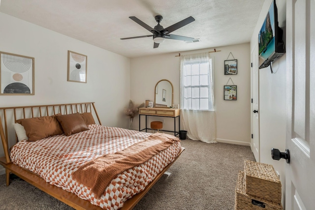 3355 Clearwater Dr, Clarksville, TN 37042 - carpeted bedroom featuring visible vents, baseboards, a textured ceiling, and a ceiling fan