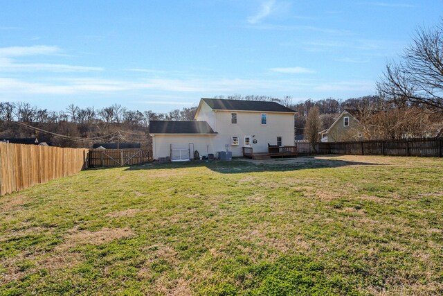 3355 Clearwater Dr, Clarksville, TN 37042 - back of property featuring a lawn, cooling unit, a wooden deck, and a fenced backyard
