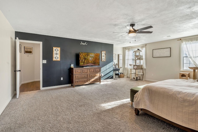 3355 Clearwater Dr, Clarksville, TN 37042 - bedroom featuring a ceiling fan, visible vents, carpet, baseboards, and a textured ceiling