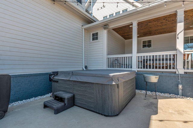 view of patio / terrace featuring a hot tub