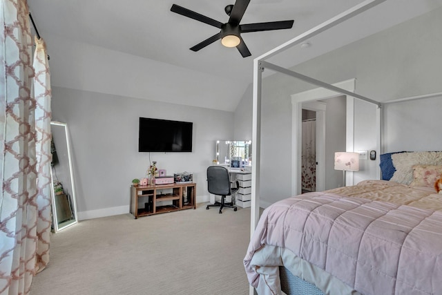 bedroom featuring baseboards, a ceiling fan, carpet, and vaulted ceiling