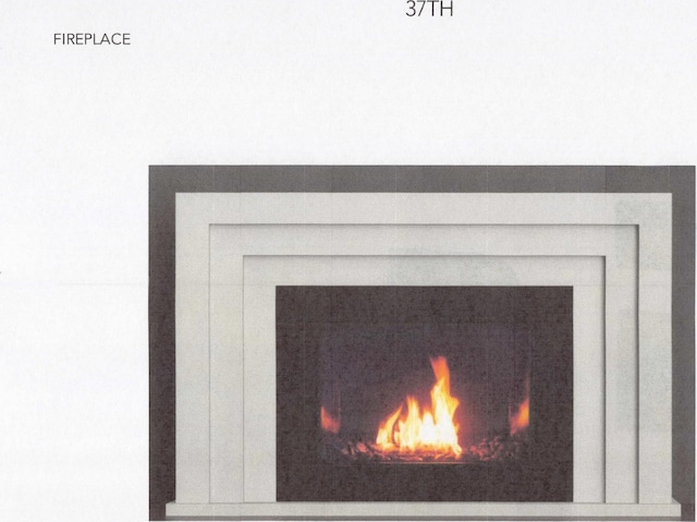 219 37th Ave N, Nashville, TN 37209 - details with a lit fireplace