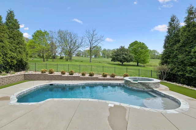 view of swimming pool with a fenced backyard, a yard, and a patio