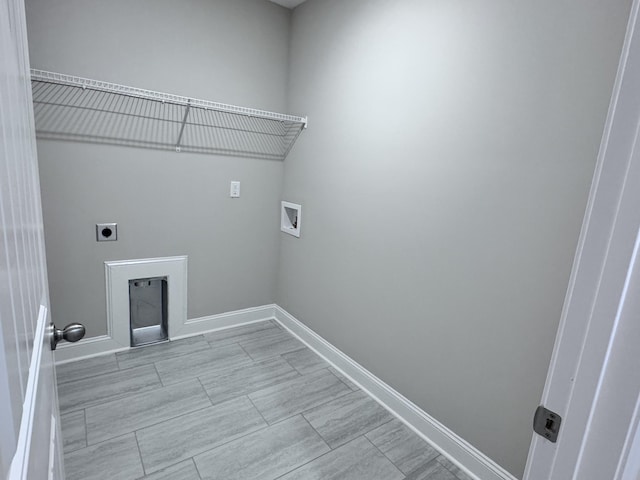 443 Generosity Way, Smyrna, TN 37167 - clothes washing area with electric dryer hookup, washer hookup, and baseboards