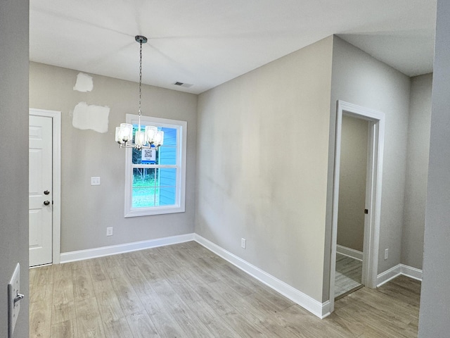 443 Generosity Way, Smyrna, TN 37167 - unfurnished dining area with a chandelier, light wood-style flooring, and baseboards