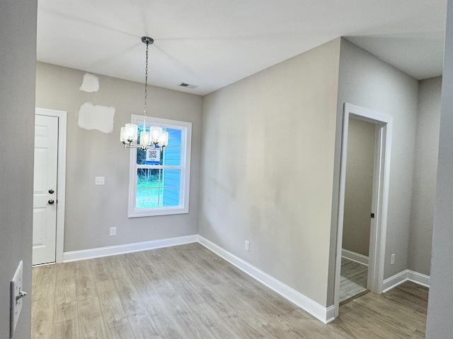 443 Generosity Way, Smyrna, TN 37167 - unfurnished dining area featuring light wood-style flooring, a chandelier, and baseboards