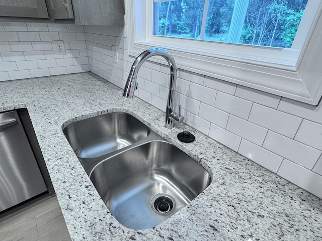 443 Generosity Way, Smyrna, TN 37167 - kitchen view of a sink, backsplash, and light stone countertops