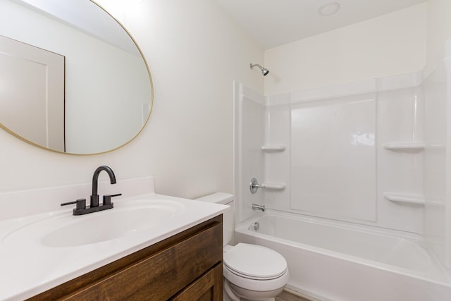 full bath featuring shower / bath combination, toilet, and vanity