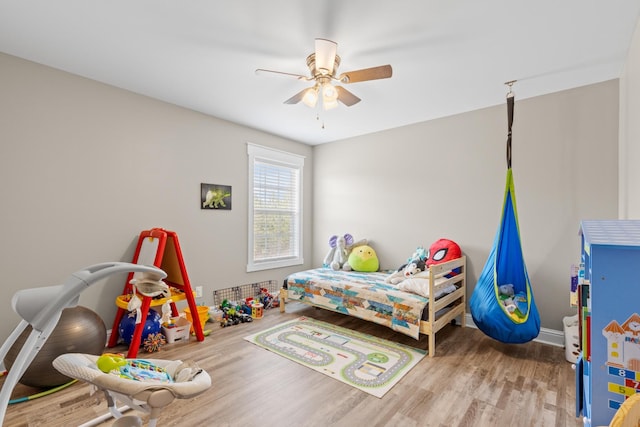 2619 Prospect Rd, Dalton, GA 30721 - bedroom featuring a ceiling fan, wood finished floors, and baseboards