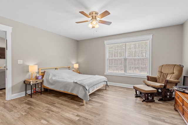 2619 Prospect Rd, Dalton, GA 30721 - bedroom with baseboards, light wood-style flooring, and a ceiling fan