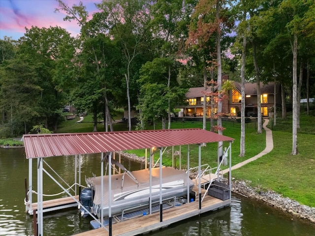 dock area featuring a yard, a water view, and boat lift