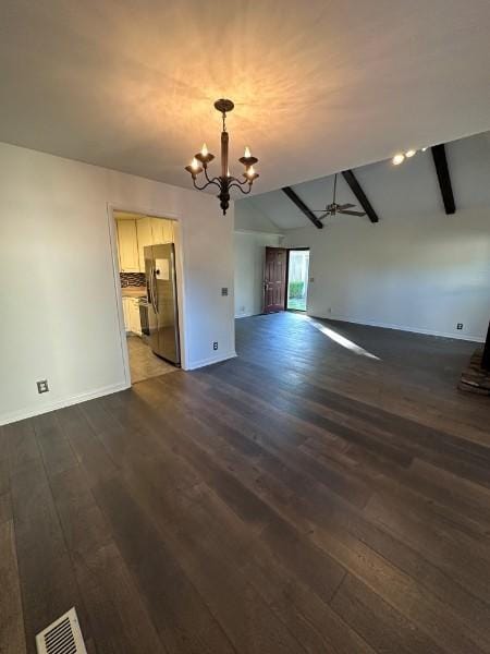 854 Todd Preis Dr, Nashville, TN 37221 - unfurnished living room with dark wood-style floors, visible vents, baseboards, lofted ceiling with beams, and ceiling fan with notable chandelier