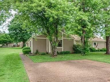 854 Todd Preis Dr, Nashville, TN 37221 - view of front of house with a front lawn
