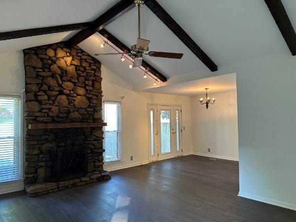 854 Todd Preis Dr, Nashville, TN 37221 - unfurnished living room with beam ceiling, dark wood-style floors, ceiling fan with notable chandelier, and a healthy amount of sunlight