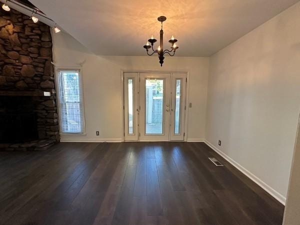 854 Todd Preis Dr, Nashville, TN 37221 - foyer entrance featuring visible vents, baseboards, a chandelier, dark wood finished floors, and vaulted ceiling